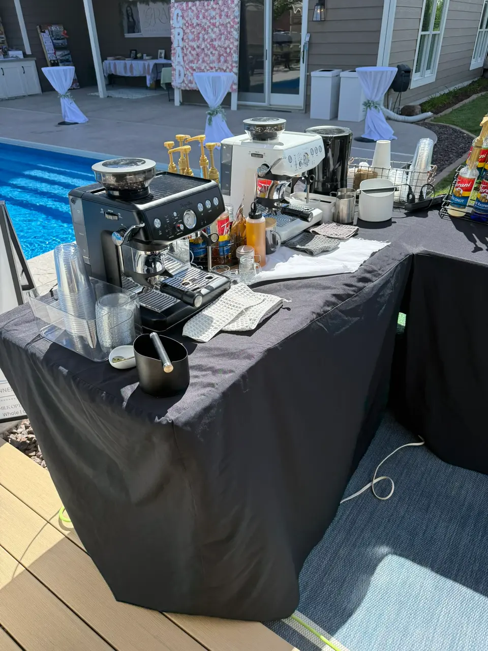 Her espresso bar set up on a pool deck for a private event